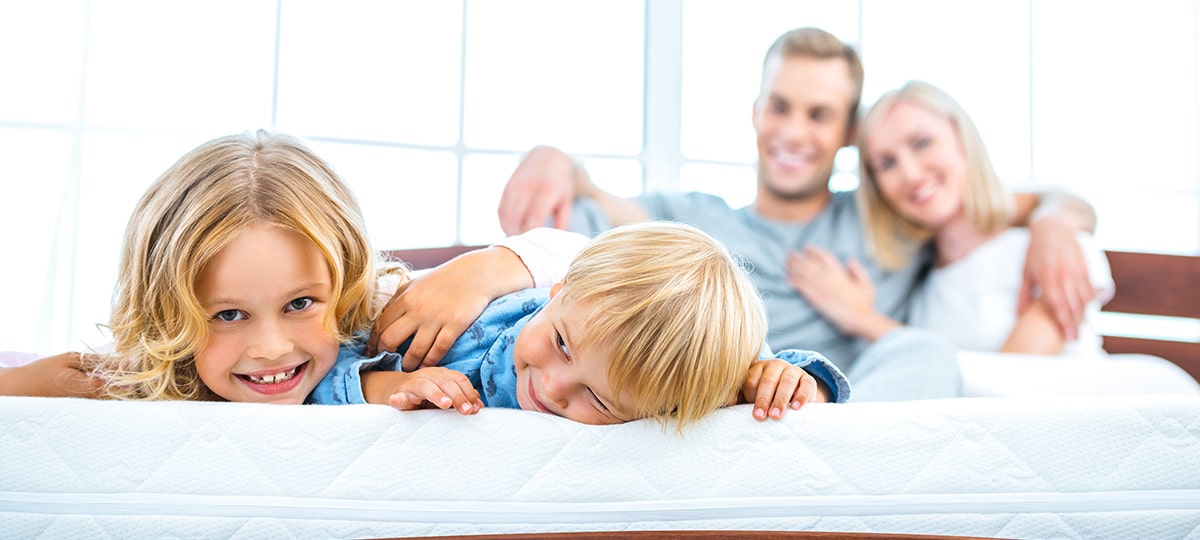 family on mattress